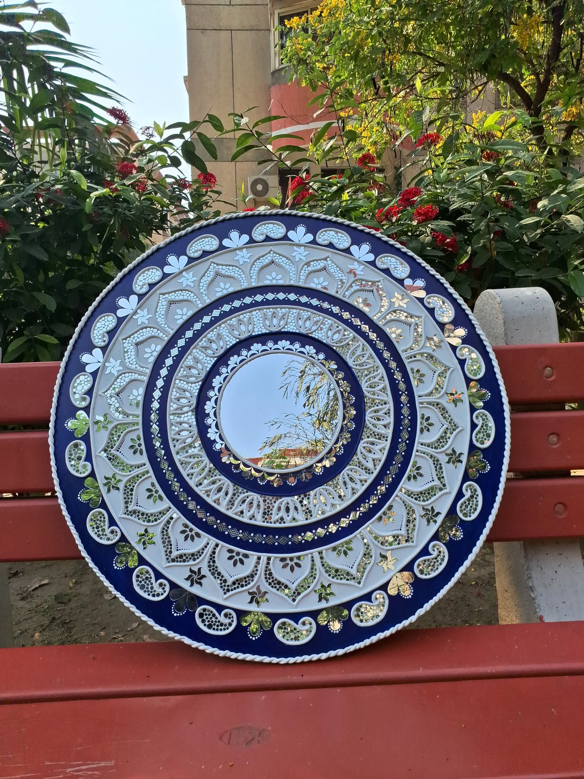 Navy and chalk-white lippan mirror mandala